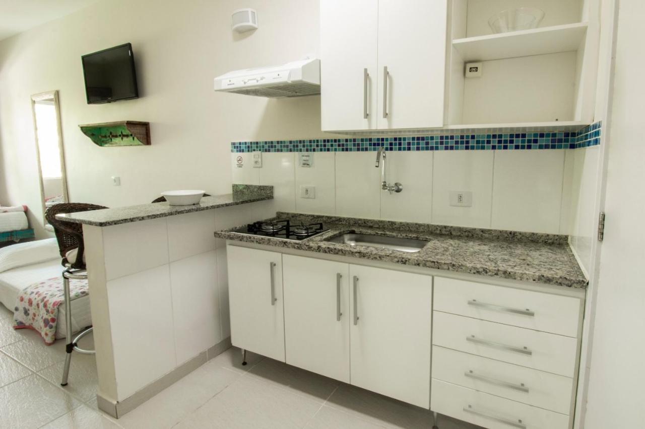 Apart Hotel Porto Kanoas Bertioga Bagian luar foto