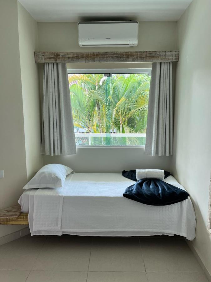 Apart Hotel Porto Kanoas Bertioga Bagian luar foto