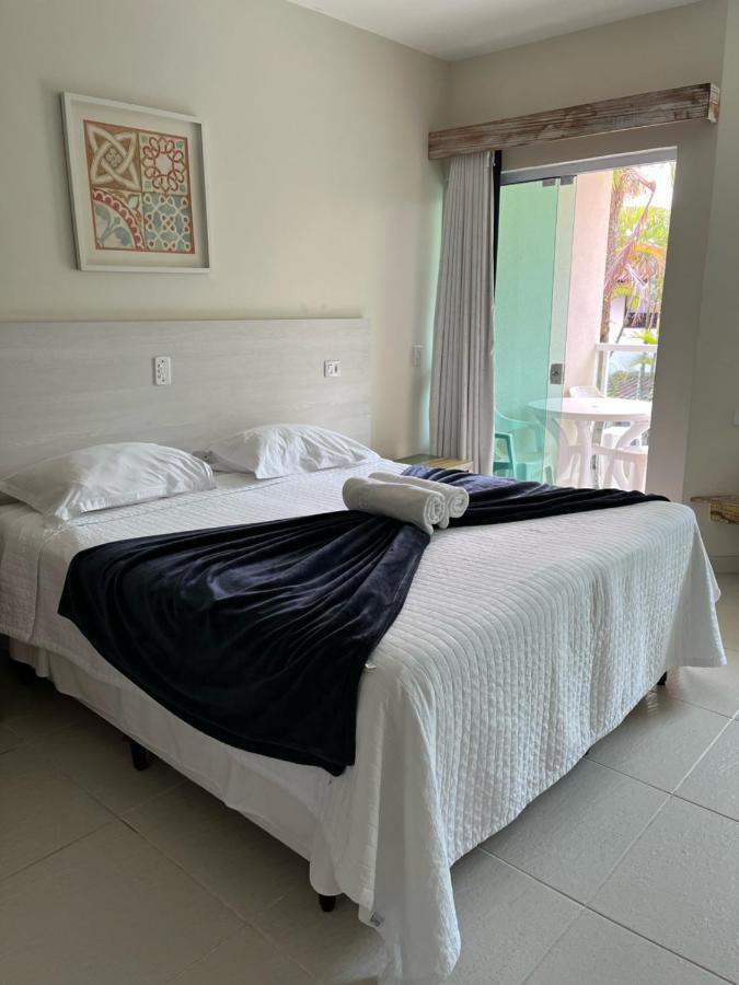 Apart Hotel Porto Kanoas Bertioga Bagian luar foto