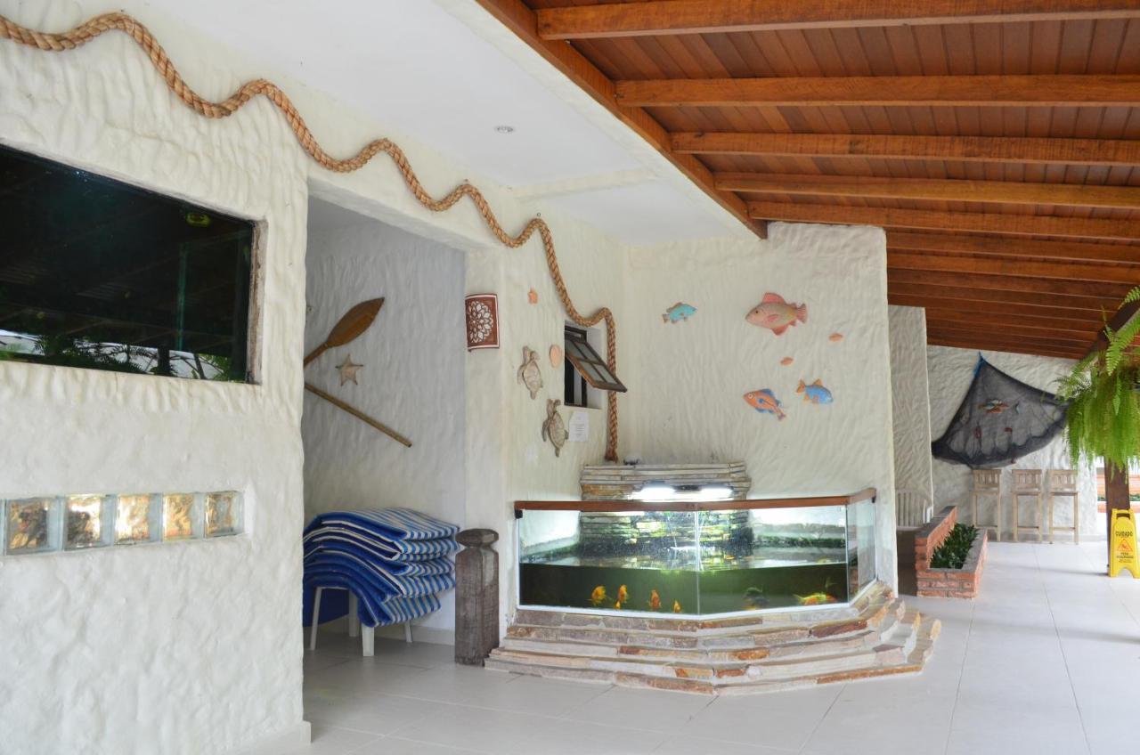 Apart Hotel Porto Kanoas Bertioga Bagian luar foto