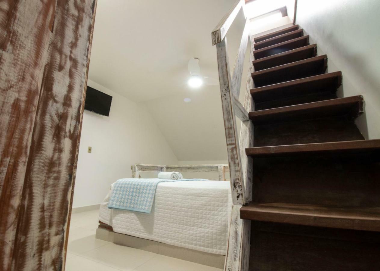 Apart Hotel Porto Kanoas Bertioga Bagian luar foto